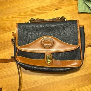 Dooney and Bourke weatherproof purse excellent condition